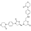 4-(((S)-2-oxo-3-(4-(3-oxomorpholino)phenyl)oxazolidin-5-yl)methyl)-6-(((4-(3-oxomorpholino)phenyl)amino)methyl)morpholin-2-one